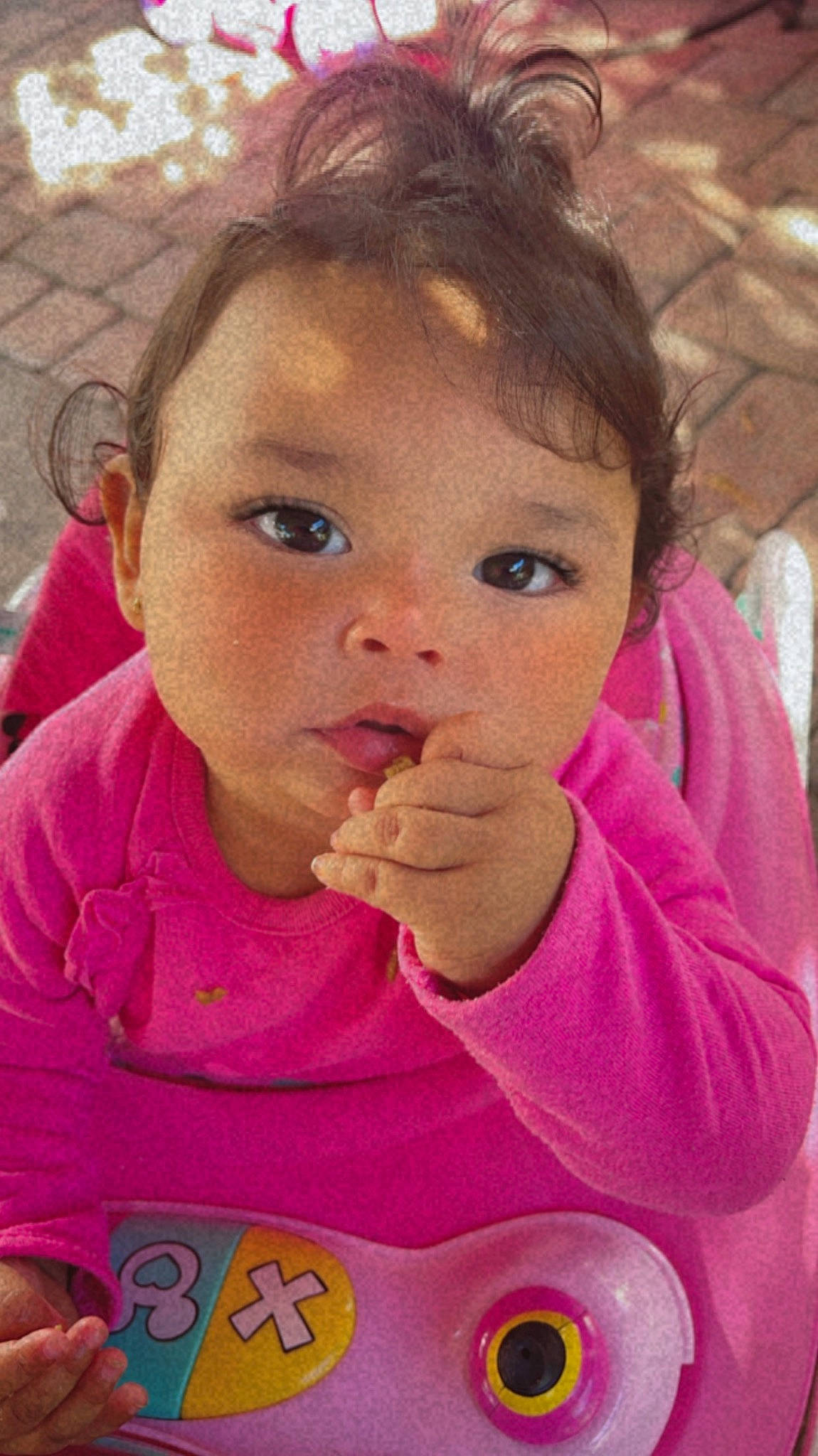 Ximena joined the competition — help win amazing prizes! baby_playing_with_food, baby_toddler_clothing, cheek, chin, ear, eye, eyebrow, eyelash, face, gesture, hair, happy, iris, lip, mouth, neck, nose, person, pink, skin