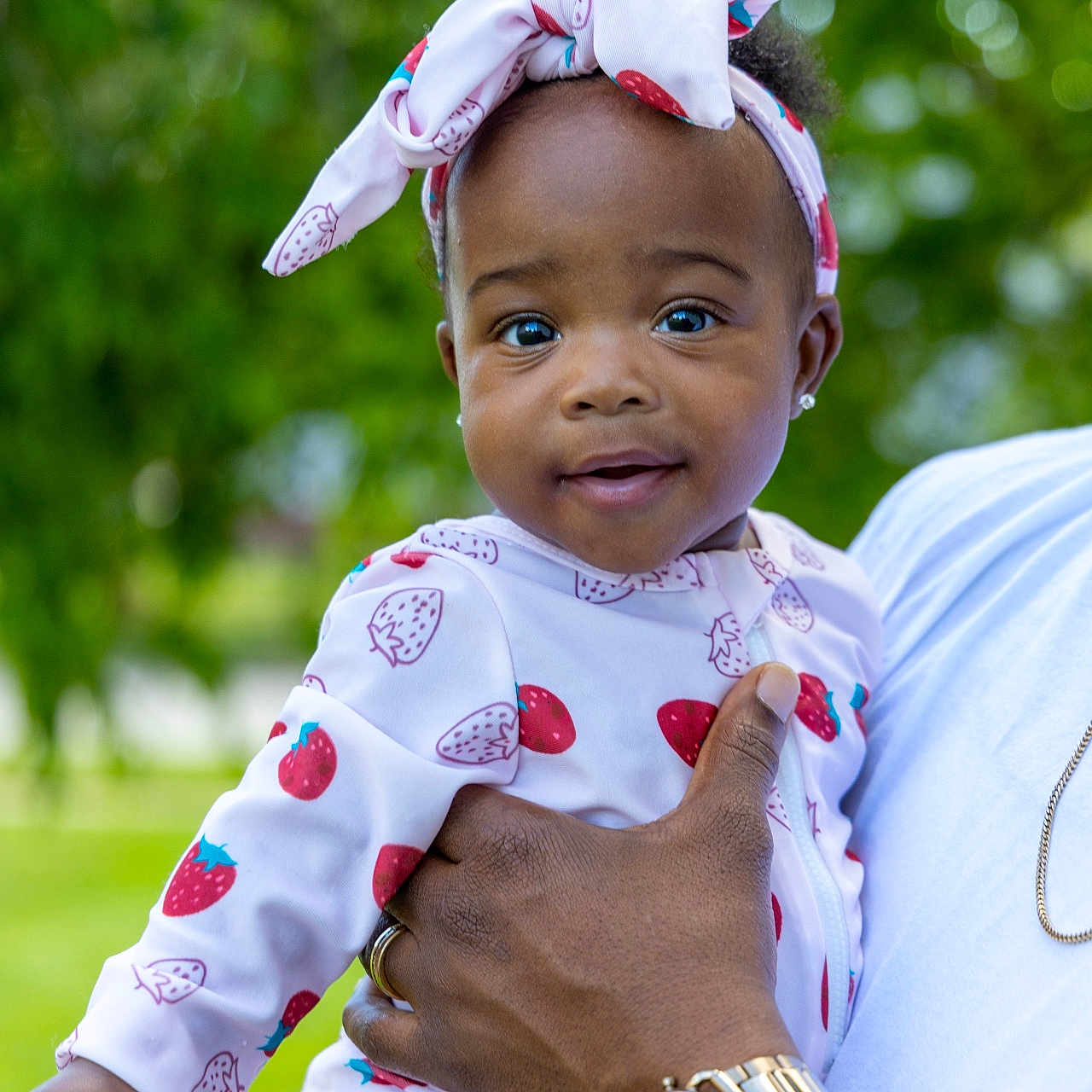 Averi joined the competition — help win amazing prizes! accessories, arm, baby, bodypart, bracelet, clothing, face, finger, hand, happy, hat, head, jewelry, people, person, photography, portrait, sitting, smile, wristwatch