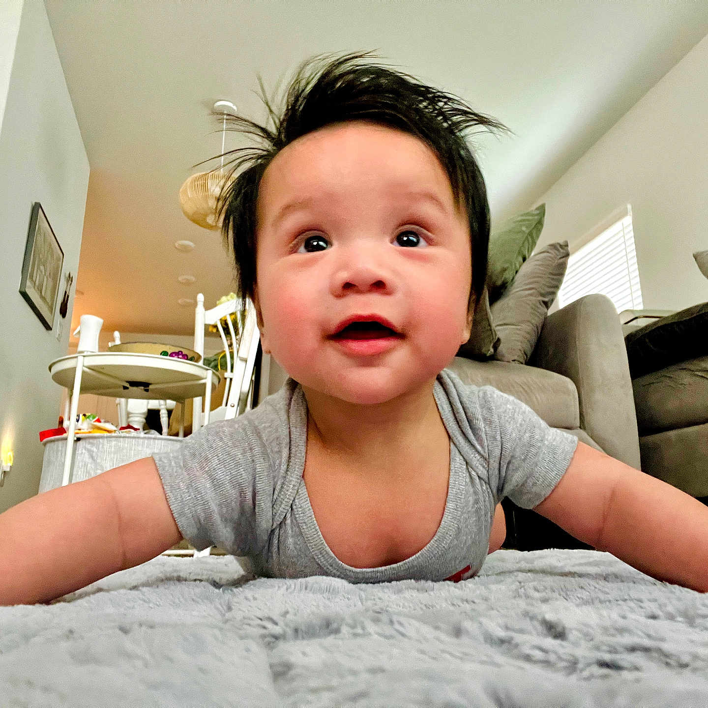 Aieden joined the competition — help win amazing prizes! baby, blanket, carpet, casual, chair, child, couch, cute, furniture, happy, home, indoor, infant, living_room, person, pillow, portrait, smiling, table, toddler