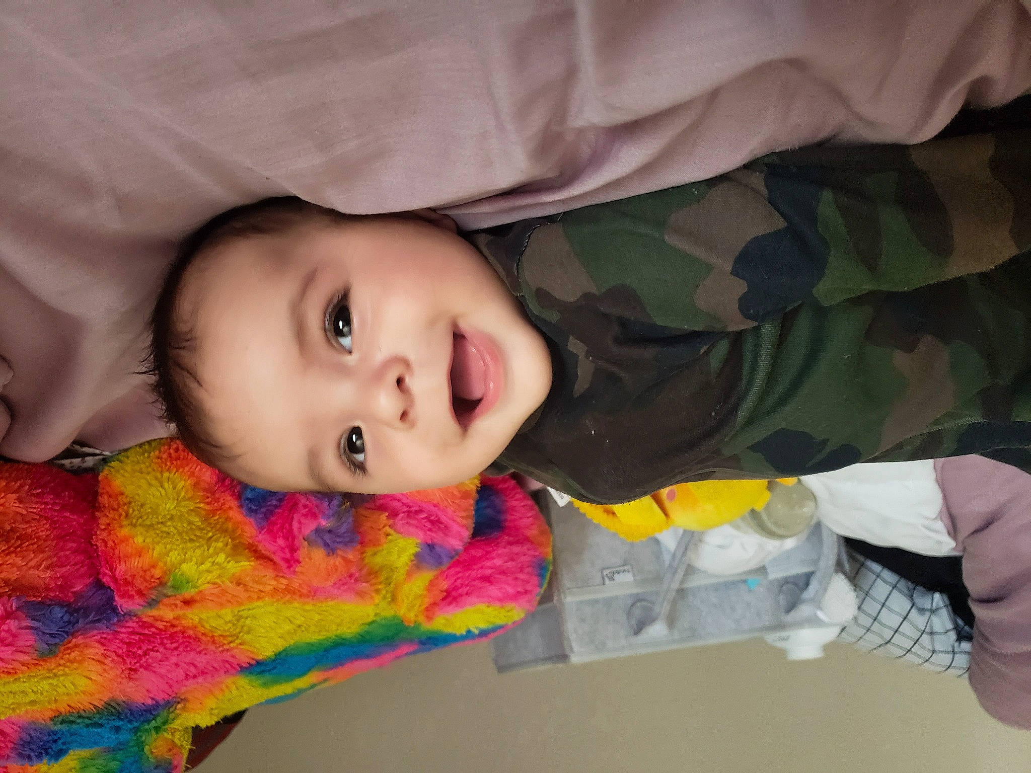 Noland is registered to the contest to win money with this photo: baby_toddler_clothing, cheek, comfort, eye, facial_expression, finger, gesture, hand, head, human_body, iris, lip, mouth, nose, person, product, skin, sleeve, smile, textile