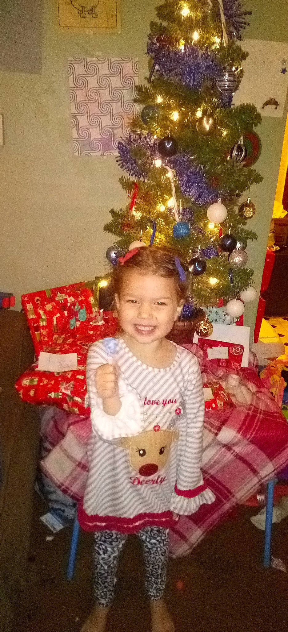 Nova joined the competition — help win amazing prizes! baby_toddler_clothing, christmas, christmas_decoration, christmas_eve, christmas_ornament, christmas_tree, conifer, event, fun, happy, head, holiday, holiday_ornament, joy, lap, ornament, person, room, sleeve, smile