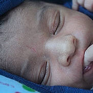 Rudra is registered to the contest to win money with this photo: baby, sleeping, face, hand, thumb, blue_blanket, closeup, peaceful, newborn, infant, skin, eyelashes, soft_light, resting, cute, portrait, child, cozy, warm, calm
