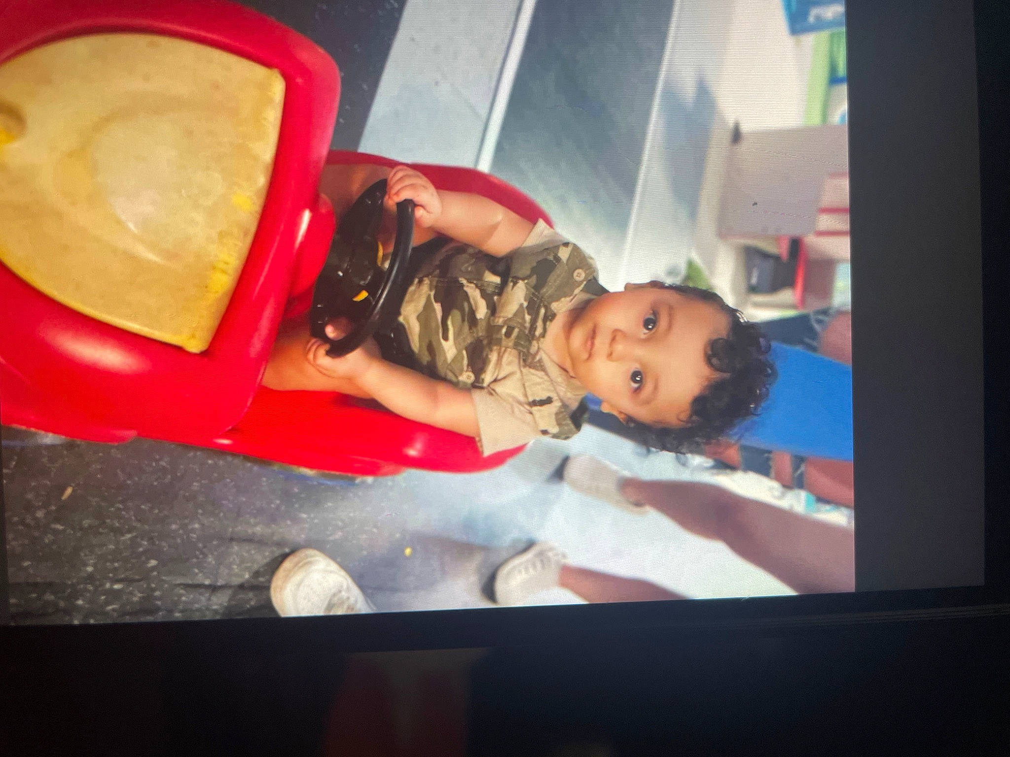 Majestic is registered to the contest to win money with this photo: art, automotive_design, automotive_exterior, automotive_lighting, bumper, carmine, display_device, flat_panel_display, fun, led_backlit_lcd_display, magenta, multimedia, person, personal_protective_equipment, plastic, room, television, television_set, toddler, vehicle_door