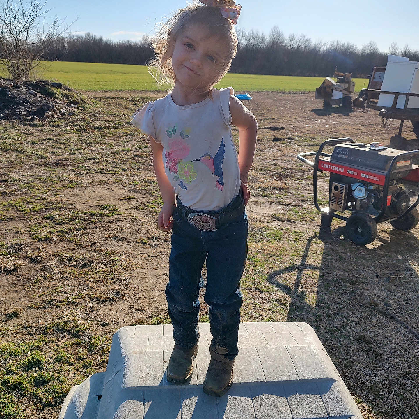 Hannah is registered to the contest to win money with this photo: boy, child, clothing, face, footwear, grass, head, jeans, machine, male, pants, path, person, photography, plant, portrait, shoe, soil, walkway, wheel
