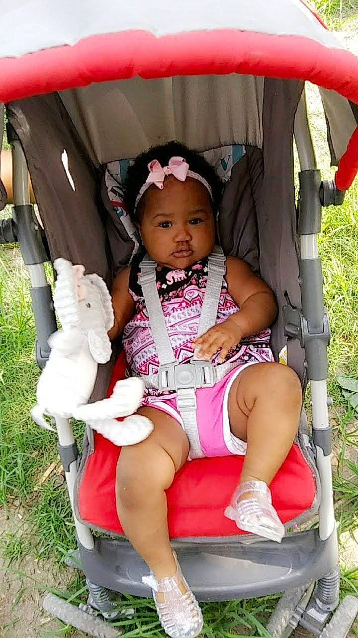 Aile joined the competition — help win amazing prizes! baby_carriage, baby_products, car_seat, child, headwear, person, product, sitting, toddler