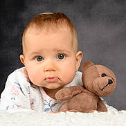 Mia participe au concours pour gagner de l'argent avec cette photo : baby, blanket, bodypart, crawling, face, finger, frown, hand, happy, head, newborn, person, photography, plush, portrait, sad, sitting, smile, teddybear, toy