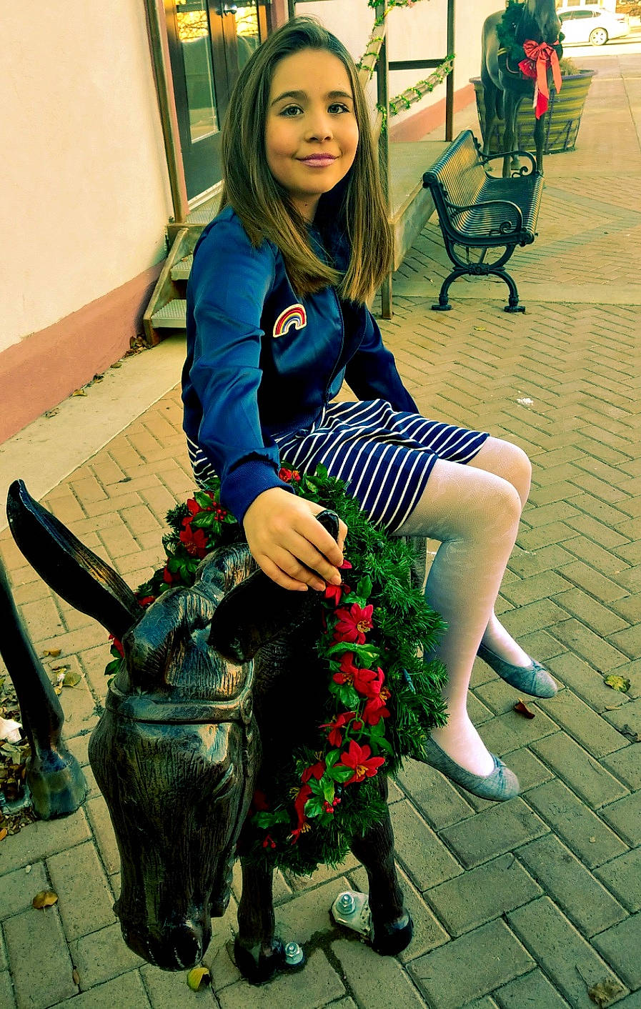 Jaidyn is registered to the contest to win money with this photo: beauty, black_hair, blue, clothing, cosplay, costume, design, dress, fashion, flower, joy, leg, long_hair, pattern, person, plant, sitting, smile, snapshot, tartan