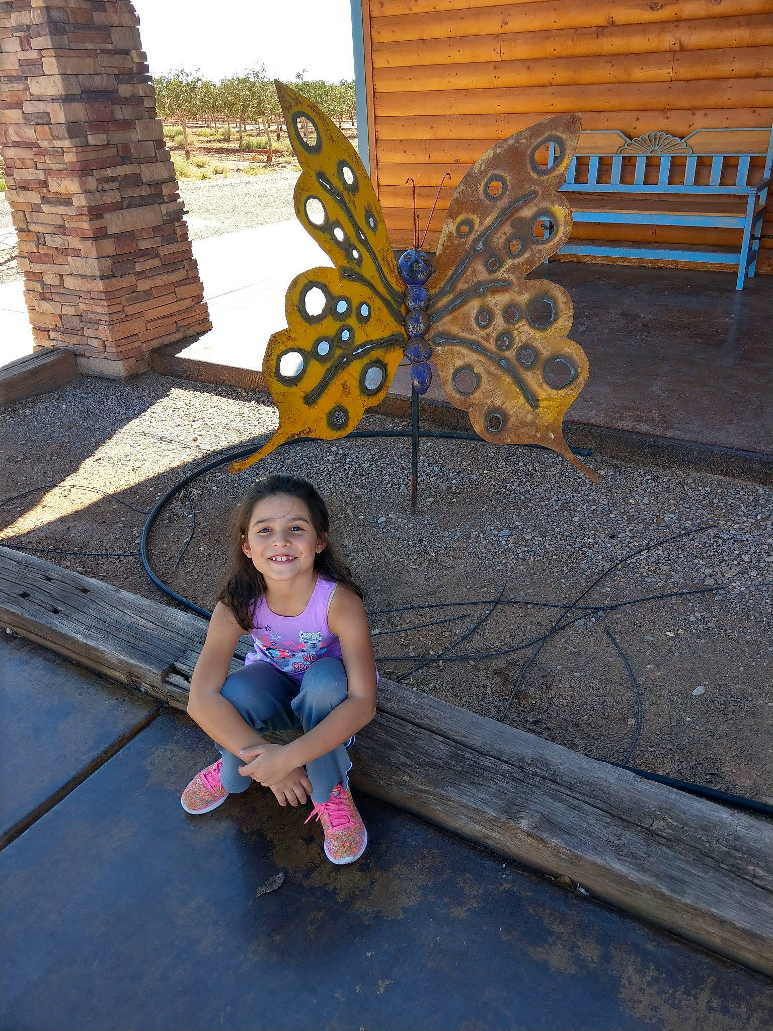 Lilyth joined the competition — help win amazing prizes! butterfly, child, concrete, fawn, fun, joy, leaf, leisure, moths_and_butterflies, person, plant, sitting, smile, summer, vacation, world, yellow