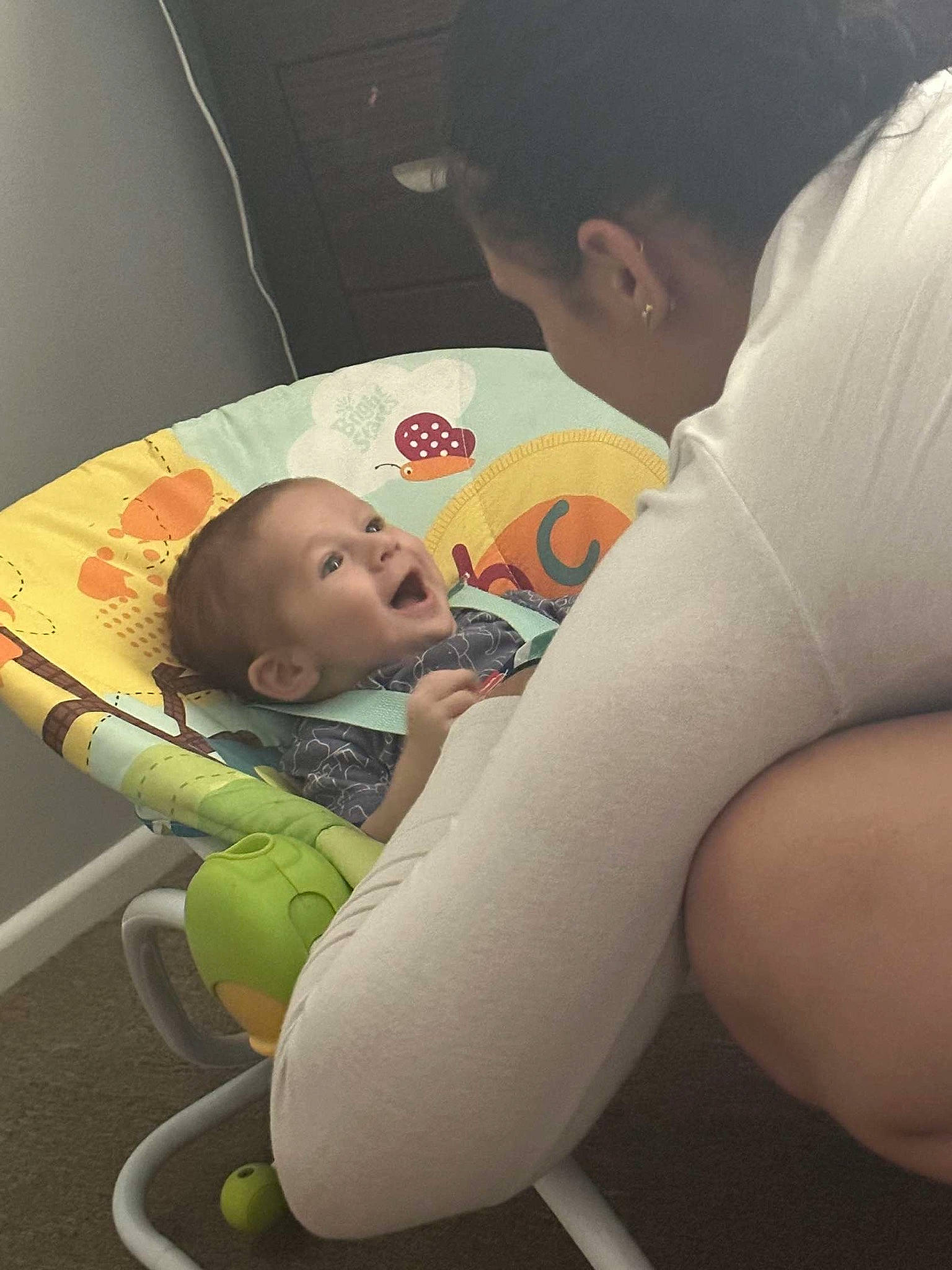 Arlo is registered to the contest to win money with this photo: abdomen, arm, baby, baby_products, chest, child, comfort, elbow, fun, happy, mouth, person, play, room, sitting, skin, t_shirt, toddler, vacation