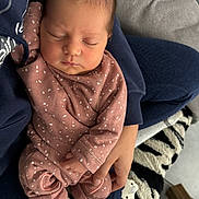 Althea participe au concours pour gagner de l'argent avec cette photo : baby, newborn, sleeping, infant, pajamas, polka_dot, hand, blanket, pacifier, cozy, soft_lighting, closeup, person, indoor, rest, cute, peaceful, clothing, child, holding