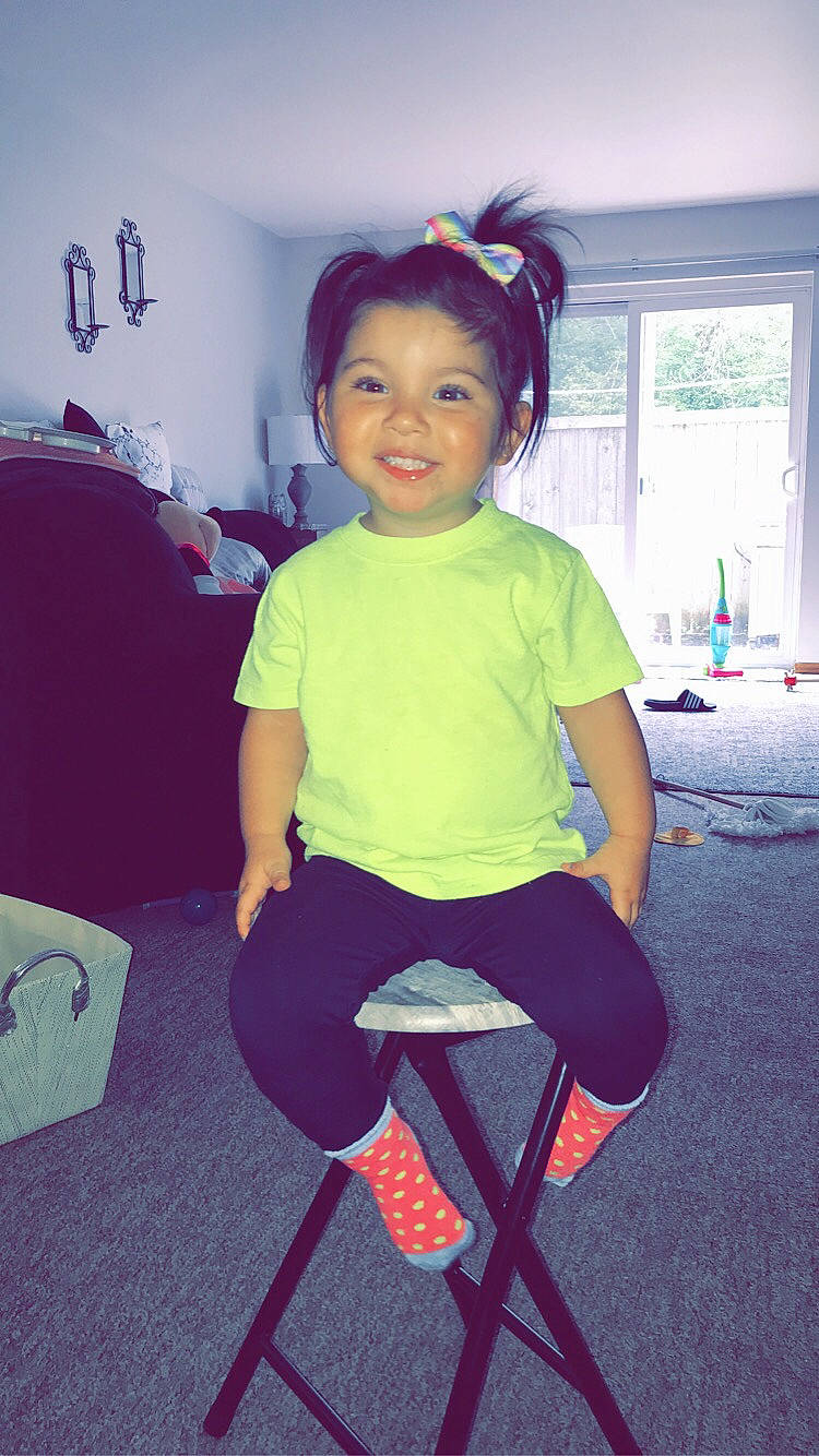 Aya joined the competition — help win amazing prizes! child, costume, furniture, headwear, joy, leg, magenta, neck, person, pink, purple, shoe, shoulder, sitting, skin, smile, standing, t_shirt, toddler