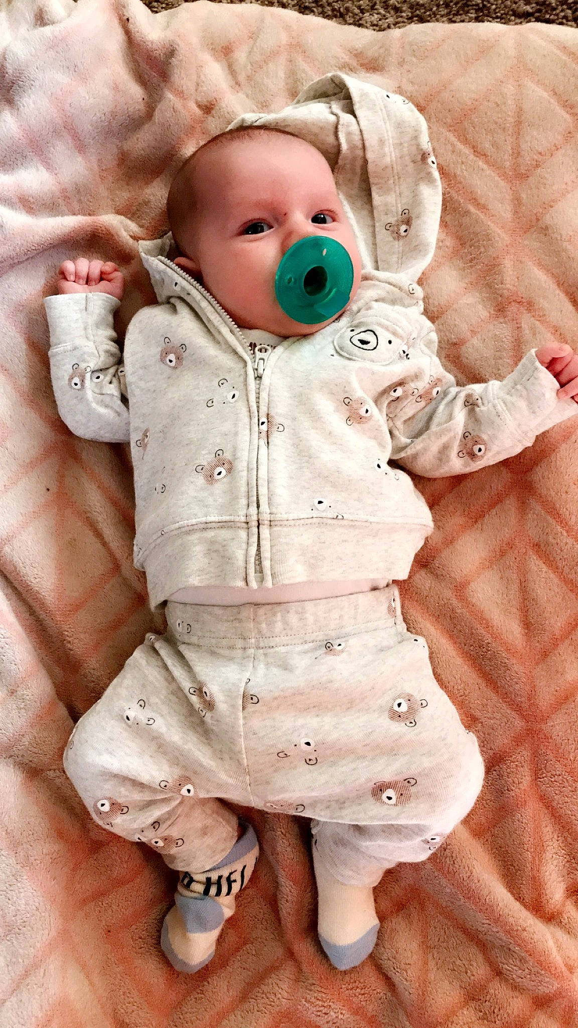 Carson is registered to the contest to win money with this photo: baby, cheek, child, doll, person, pink, toddler, toy