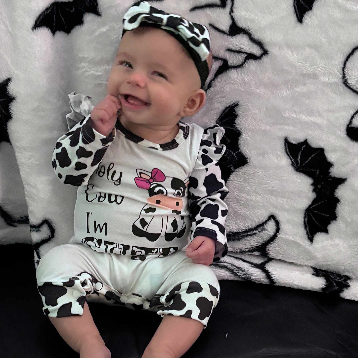 Heleena is registered to the contest to win money with this photo: baby, babylaughing, bodypart, clothing, couch, cushion, face, finger, furniture, hand, happy, head, homedecor, pants, person, photography, portrait, sitting, smile, t_shirt