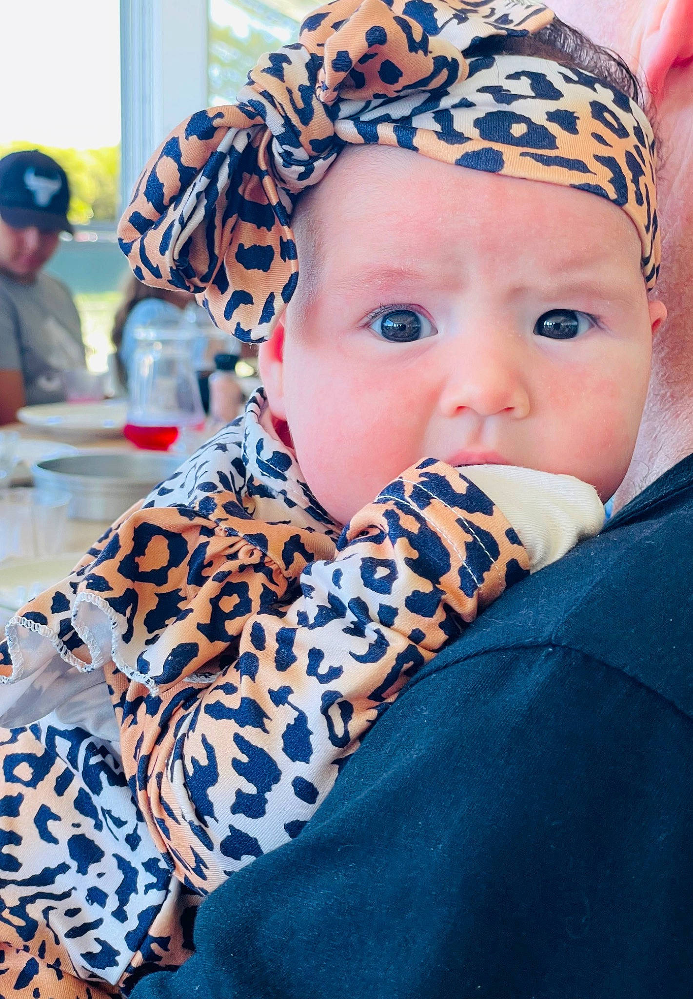 Skylar is registered to the contest to win money with this photo: baby, baby_toddler_clothing, beanie, cap, child, electric_blue, fashion_accessory, fun, happy, hat, headgear, headwear, iris, knit_cap, leisure, lip, pattern, person, portrait_photography, sitting