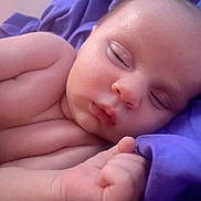 Héléa participe au concours pour gagner de l'argent avec cette photo : baby, calm, child, closeup, cute, fabric, face, hand, indoors, infant, newborn, peaceful, portrait, purple, relaxation, rest, skin, sleeping, soft, toddler