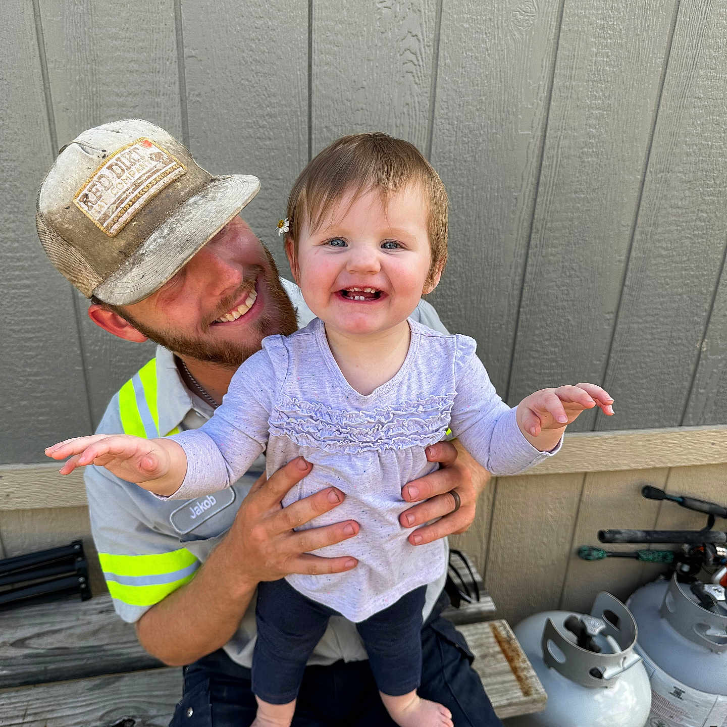 Hayden is registered to the contest to win money with this photo: accessories, baby, baseballcap, bodypart, cap, clothing, face, finger, hand, hat, head, jewelry, necklace, pants, person, photography, plant, portrait, pottedplant, wood