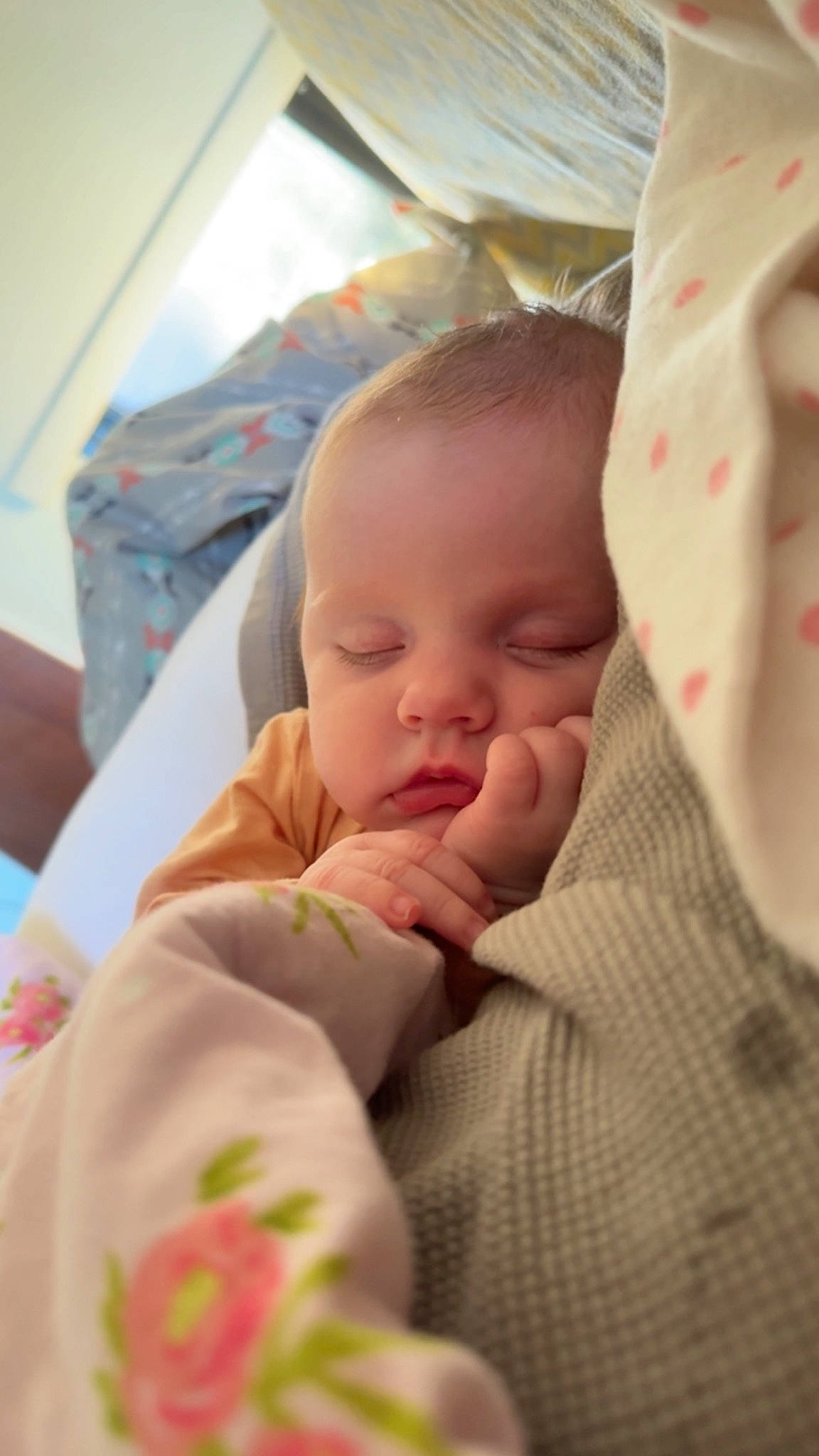 Hayden Rae is registered to the contest to win money with this photo: baby, baby_toddler_clothing, bedtime, carmine, cheek, child, comfort, face, facial_expression, finger, head, linens, lip, mouth, nose, person, product, room, skin, sleeve