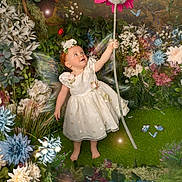 Aaliyah is registered to the contest to win money with this photo: child, fairy, dress, flower, butterflies, grass, pond, koi_fish, garden, flowers, greenery, barefoot, fantasy, magic, nature, cute, portrait, whimsical, fantastical, young