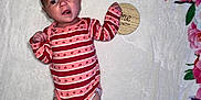 Lilah joined the competition — help win amazing prizes! baby, infant, onesie, striped_clothing, heart_pattern, blanket, floral_border, wooden_plaque, one_month, newborn, lying_down, expression, cute, soft_texture, pink, red, white, skin, small_hands, small_feet