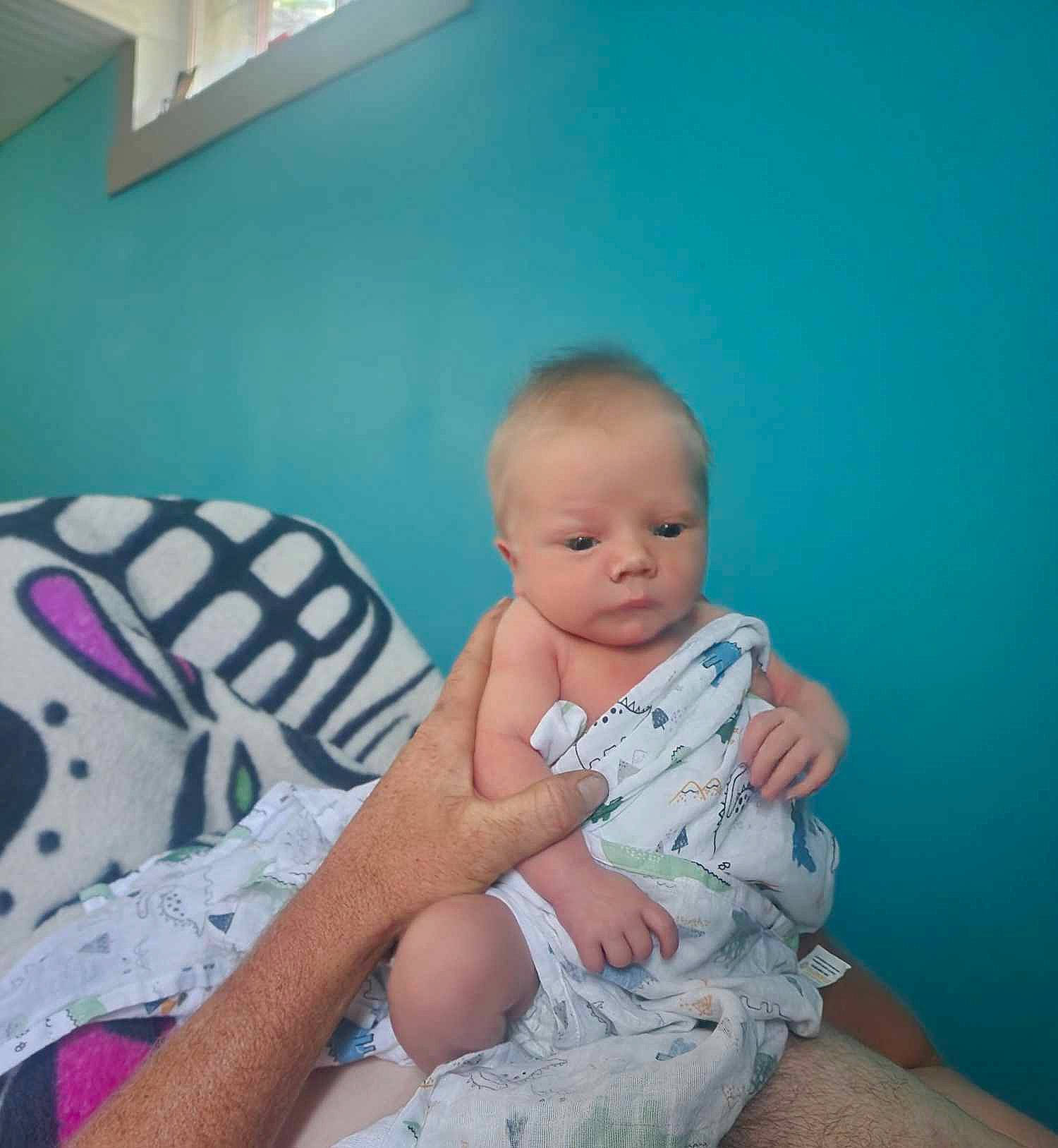 Cash joined the competition — help win amazing prizes! abdomen, arm, baby, baby_toddler_clothing, chair, chest, child, comfort, elbow, foot, happy, human_leg, knee, lap, pattern, person, sitting, stomach, thigh, toddler