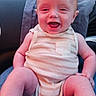 Samuel joined the competition — help win amazing prizes! baby, child, smiling, onesie, car_interior, dashboard, seat, road, nature, greenery, person, happy, infant, sitting, window, daylight, casual_clothing, skin, head, legs