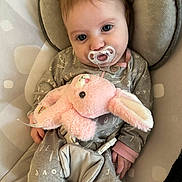 Ellipsis joined the competition — help win amazing prizes! baby, infant, pacifier, plush_bunny, onesie, bouncer_seat, safety_buckle, blue_eyes, cute, soft_toy, portrait, indoor, cozy, hand, hair, fabric_pattern, closeup, sleepy, nursery_item, adorable
