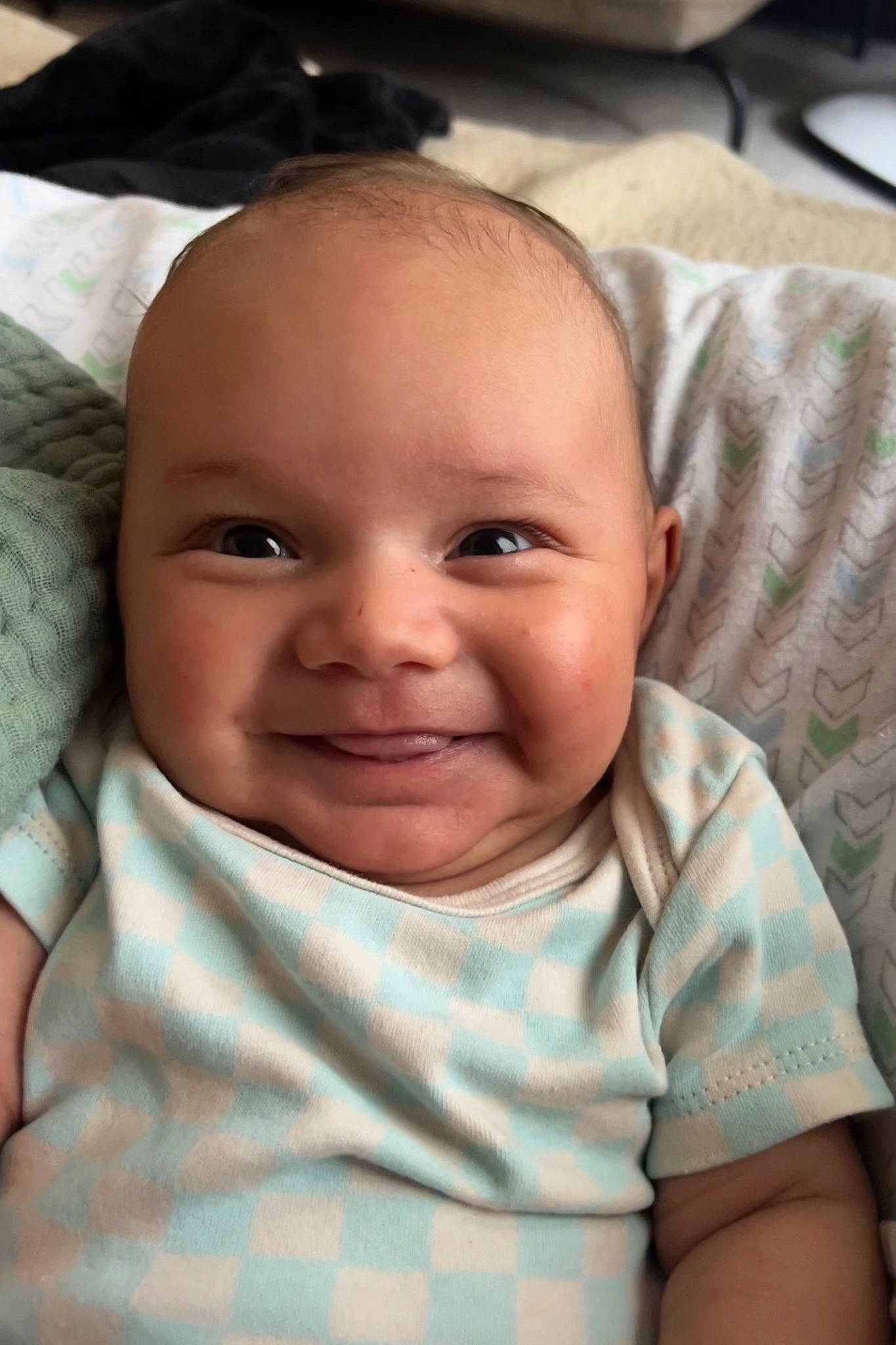 Easton is registered to the contest to win money with this photo: baby, baby_toddler_clothing, cheek, child, chin, comfort, ear, eyebrow, eyelash, forehead, happy, human, iris, joy, lip, mouth, nose, person, skin, sleeve