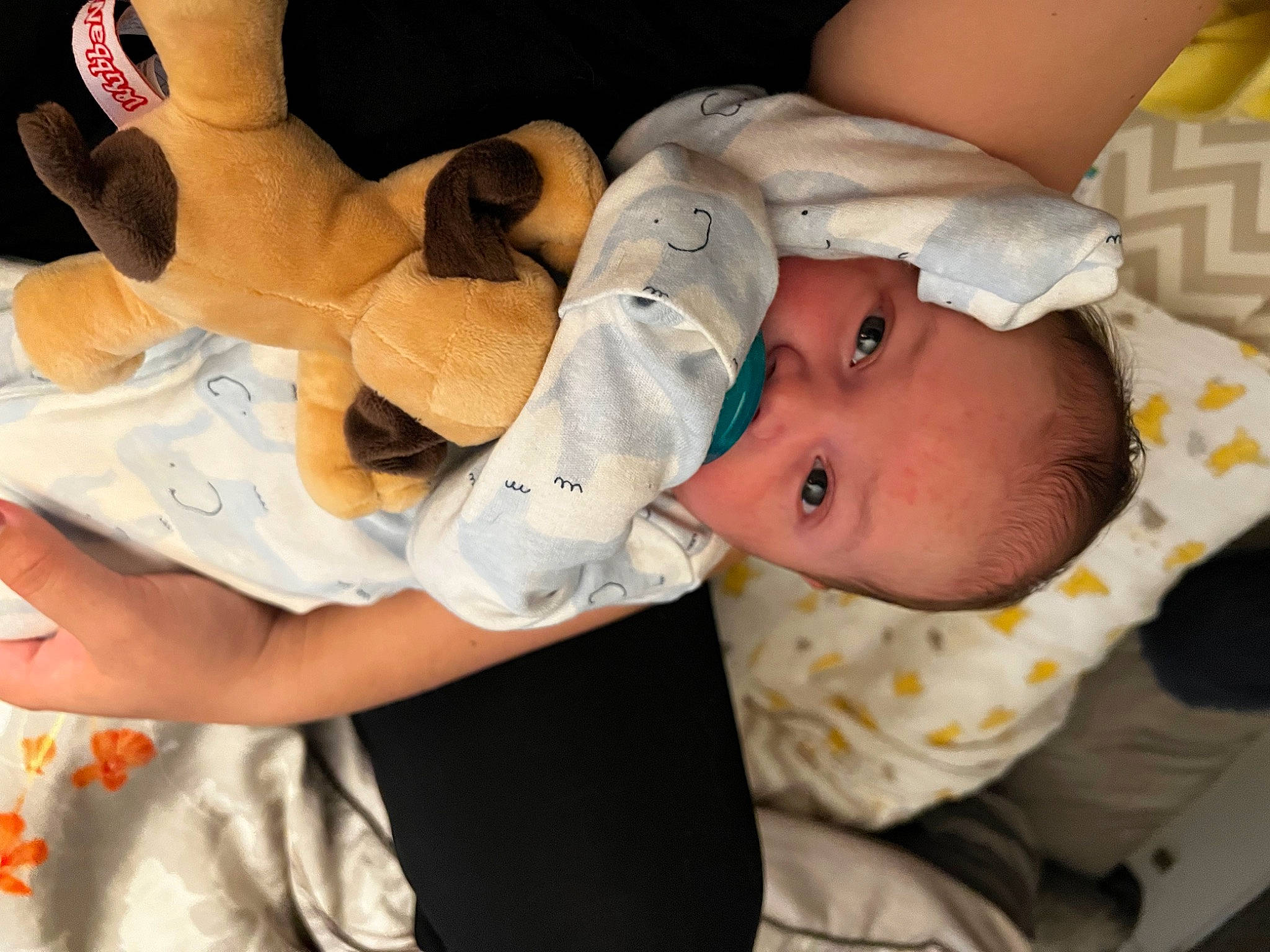 Easton is registered to the contest to win money with this photo: abdomen, baby, baby_products, baby_toddler_clothing, cheek, chest, child, comfort, elbow, eye, gesture, human_body, human_leg, linens, mouth, nail, person, skin, thigh, toddler