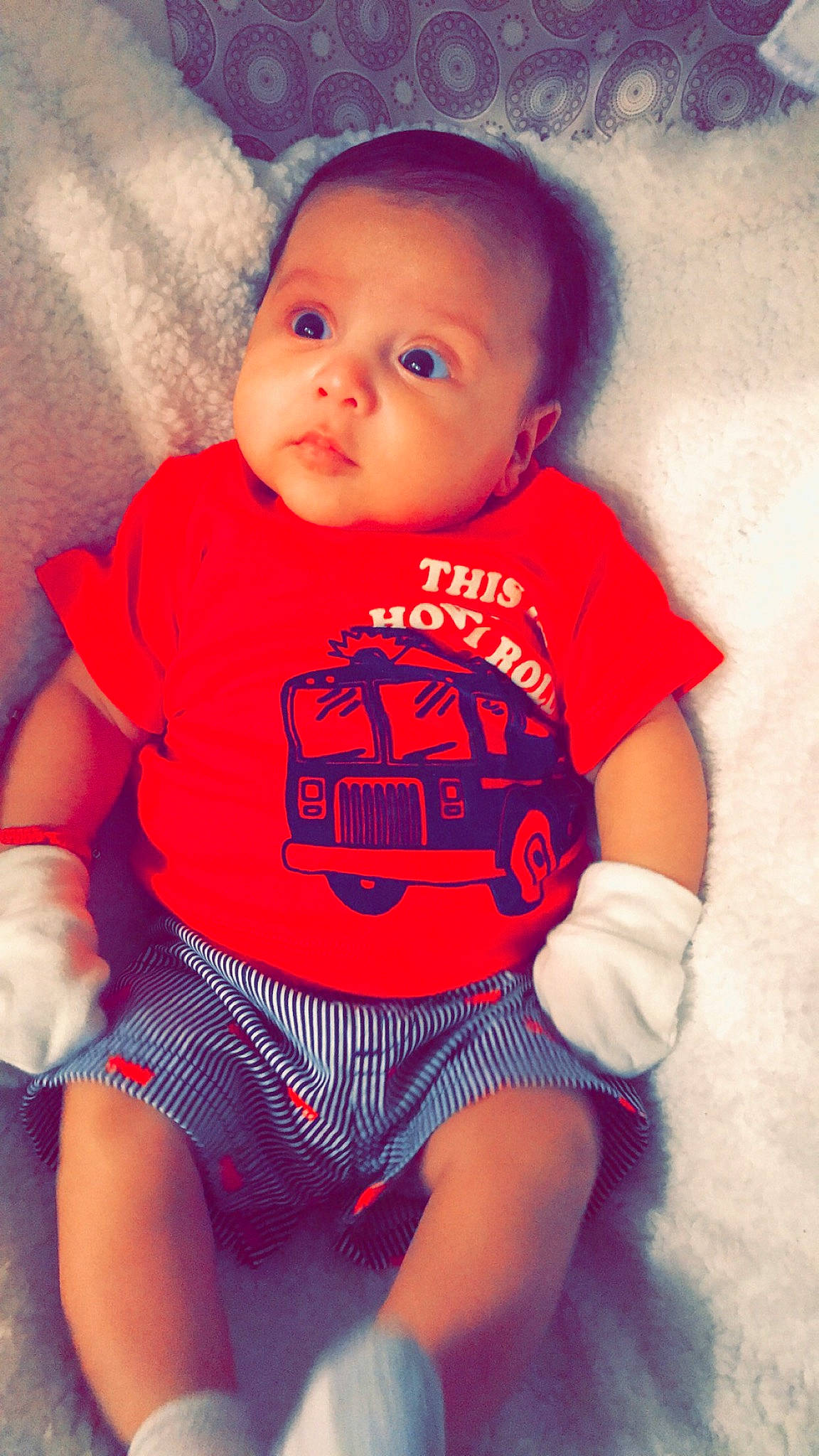 Azriel is registered to the contest to win money with this photo: azure, baby_toddler_clothing, cheek, chin, eyebrow, happy, human, human_body, iris, lip, mouth, neck, nose, orange, person, pink, skin, sleeve, standing, t_shirt