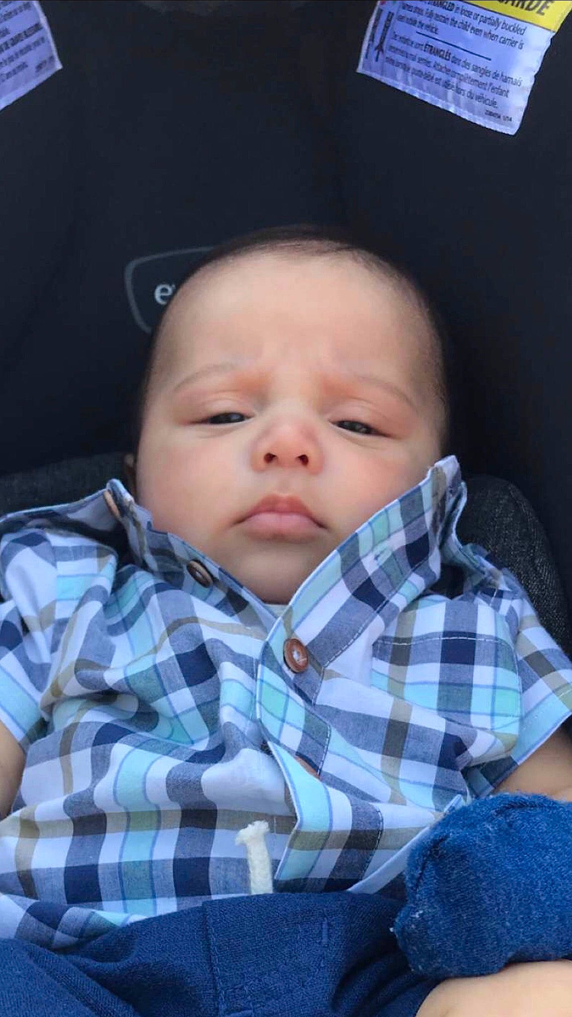 Azriel is registered to the contest to win money with this photo: baby, baby_toddler_clothing, cheek, child, chin, collar, comfort, dress_shirt, eyelash, iris, lip, nose, pattern, person, plaid, sitting, skin, sleeve, tartan, textile