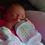 Aliyah joined the competition — help win amazing prizes! baby, bottle, blanket, child, clothing, comfort, cute, feeding, hand, infant, milk, nap, peaceful, person, pink, portrait, sleep, soft, toddler, warm