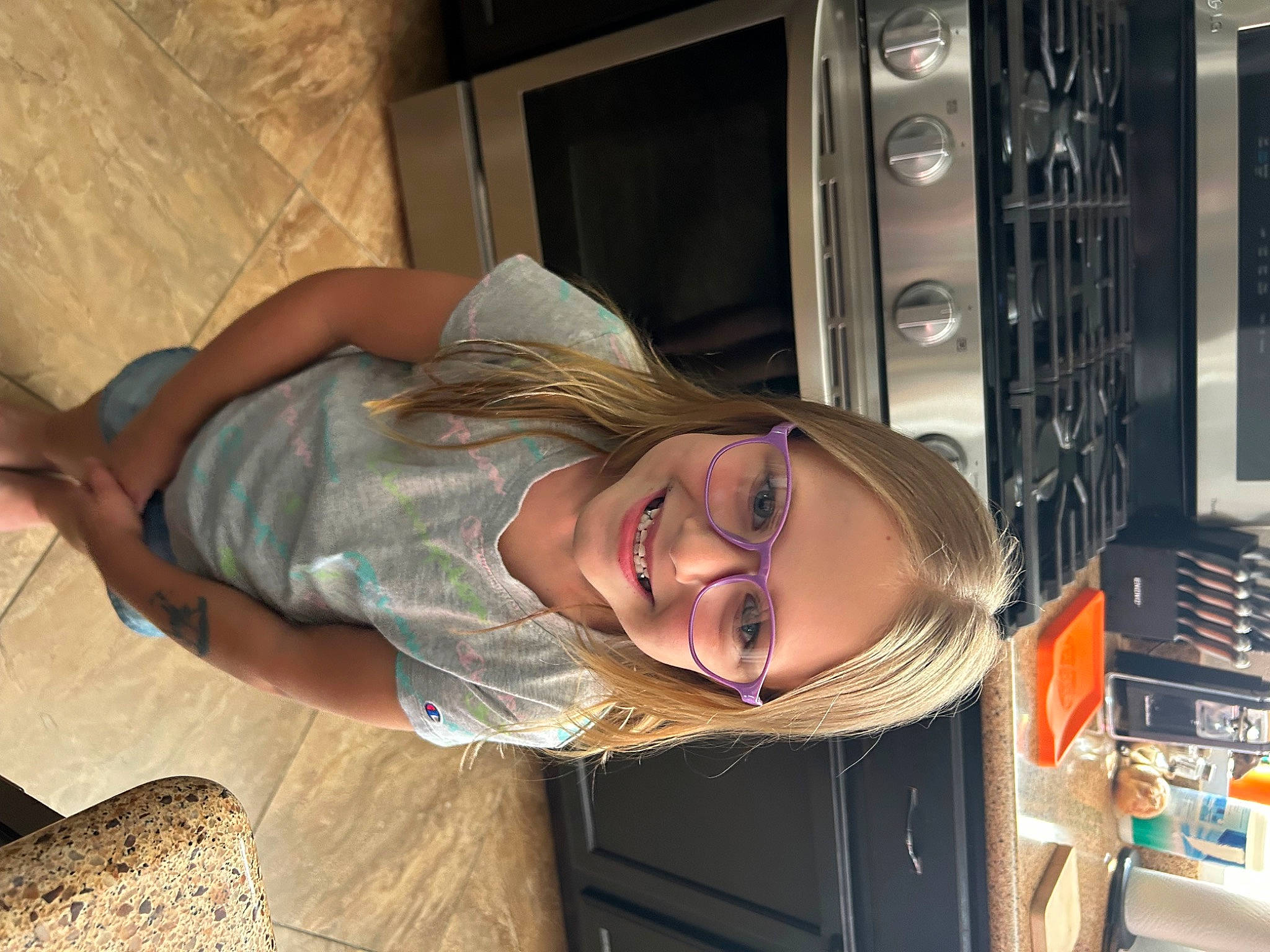 Kaylyn joined the competition — help win amazing prizes! audio_equipment, automotive_design, automotive_lighting, comfort, eyewear, fun, glasses, happy, hat, human_leg, jaw, joy, leg, long_hair, machine, mouth, person, smile, sunglasses, thigh