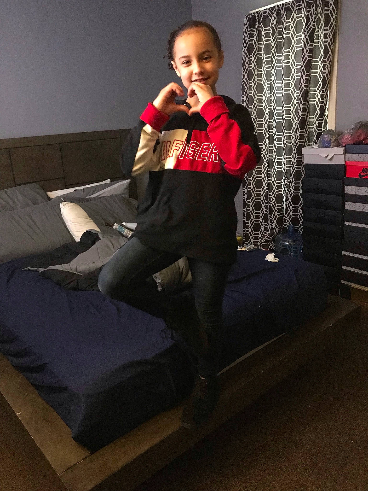 Kayda joined the competition — help win amazing prizes! cabinetry, chest_of_drawers, comfort, couch, drawer, event, eyewear, fashion_design, flash_photography, flooring, formal_wear, furniture, human_leg, joy, knee, leg, living_room, person, sitting, studio_couch