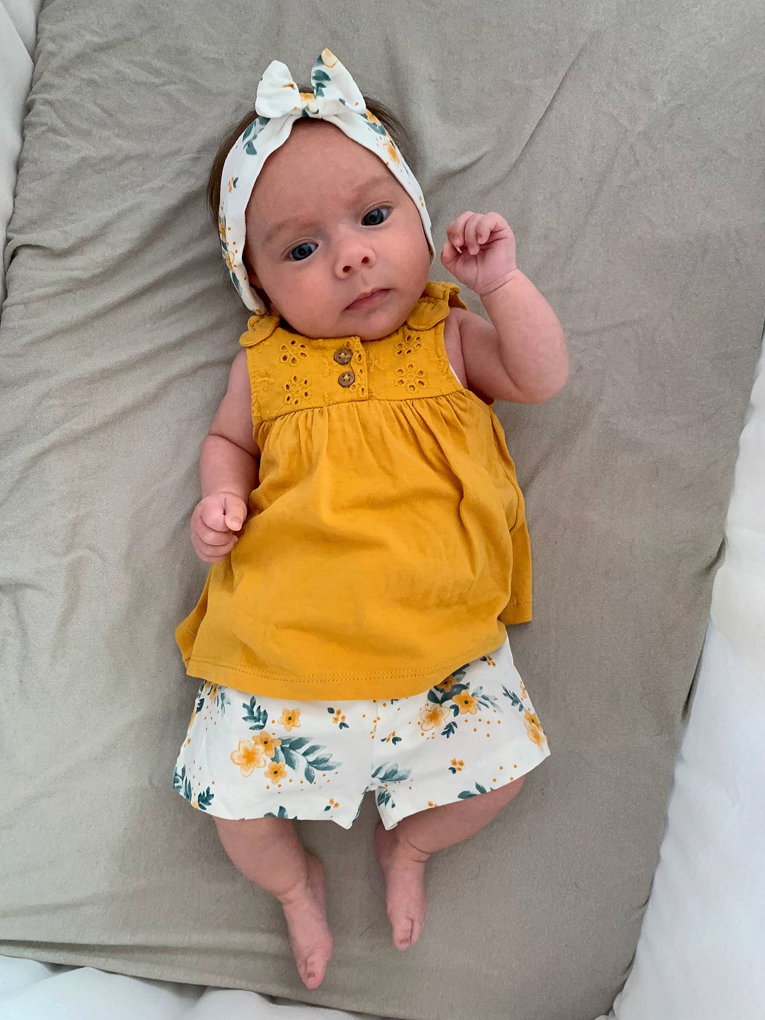 Emy participe au concours pour gagner de l'argent avec cette photo : abdomen, arm, baby, baby_toddler_clothing, costume, costume_hat, day_dress, doll, eye, head, headwear, human_leg, linens, pattern, person, pink, sleeve, t_shirt, textile, thigh