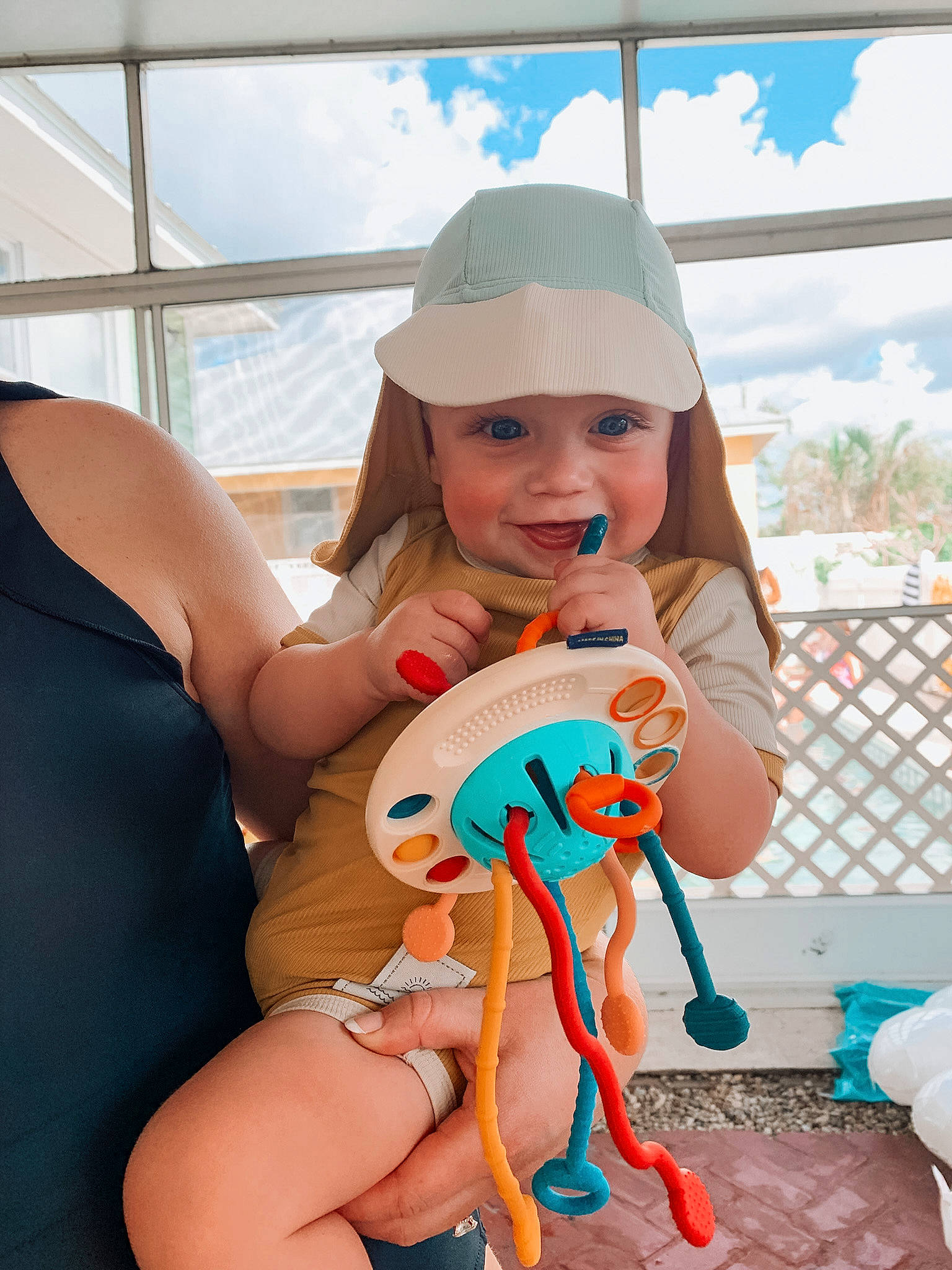 Jack is registered to the contest to win money with this photo: baby_toddler_clothing, baseball_cap, blue, cap, child, cloud, electric_blue, fun, hairstyle, happy, hat, headwear, human_leg, leisure, nail, people, person, skin, sky, summer
