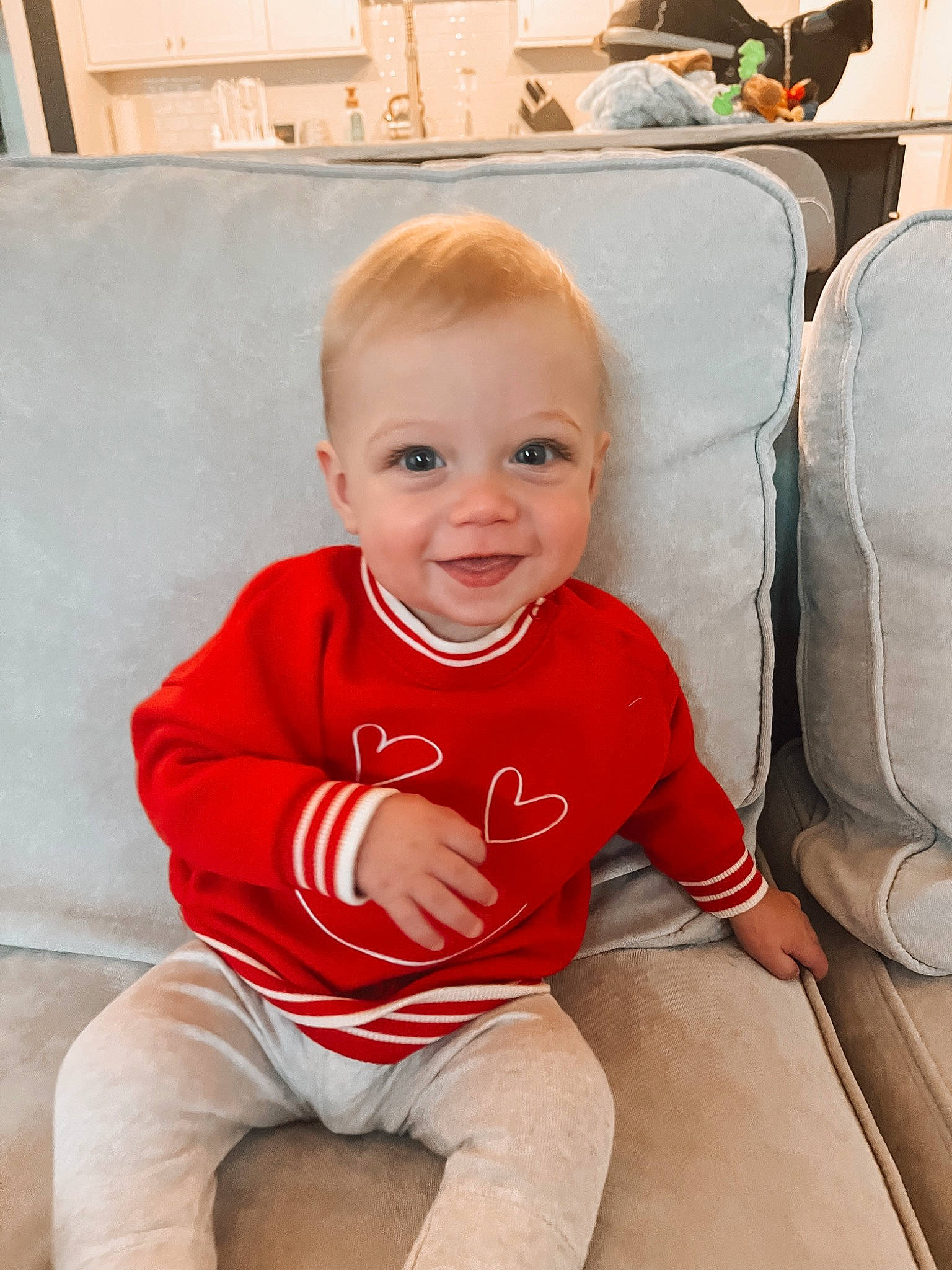 Jack is registered to the contest to win money with this photo: baby, baby_toddler_clothing, chair, cheek, child, comfort, eye, flooring, fun, hair, happy, joy, knee, mouth, person, sitting, skin, sleeve, smile, t_shirt