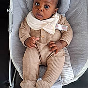 Ugomsinachi joined the competition — help win amazing prizes! baby, blackhair, clothing, crib, face, furniture, hair, happy, head, hosiery, infantbed, knitwear, person, photography, portrait, sitting, sleeve, smile, sock, sweater