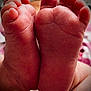 Nova is registered to the contest to win money with this photo: baby, feet, close_up, skin, toes, infant, newborn, wrinkles, soft, small, cute, human, body_part, pink, detail, texture, indoor, hand, holding, footprint