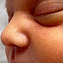 baby, close_up, face, skin, nose, eye, sleeping, child, infant, mouth, cheek, soft, peaceful, portrait, newborn, human, cute, detail, texture, innocence
