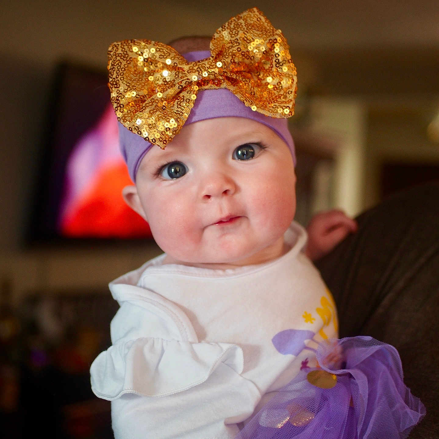 Aurora Mae joined the competition — help win amazing prizes! accessories, baby, bodypart, bonnet, bowtie, cap, clothing, couch, dress, face, finger, formalwear, furniture, hand, hat, head, person, photography, portrait, tie