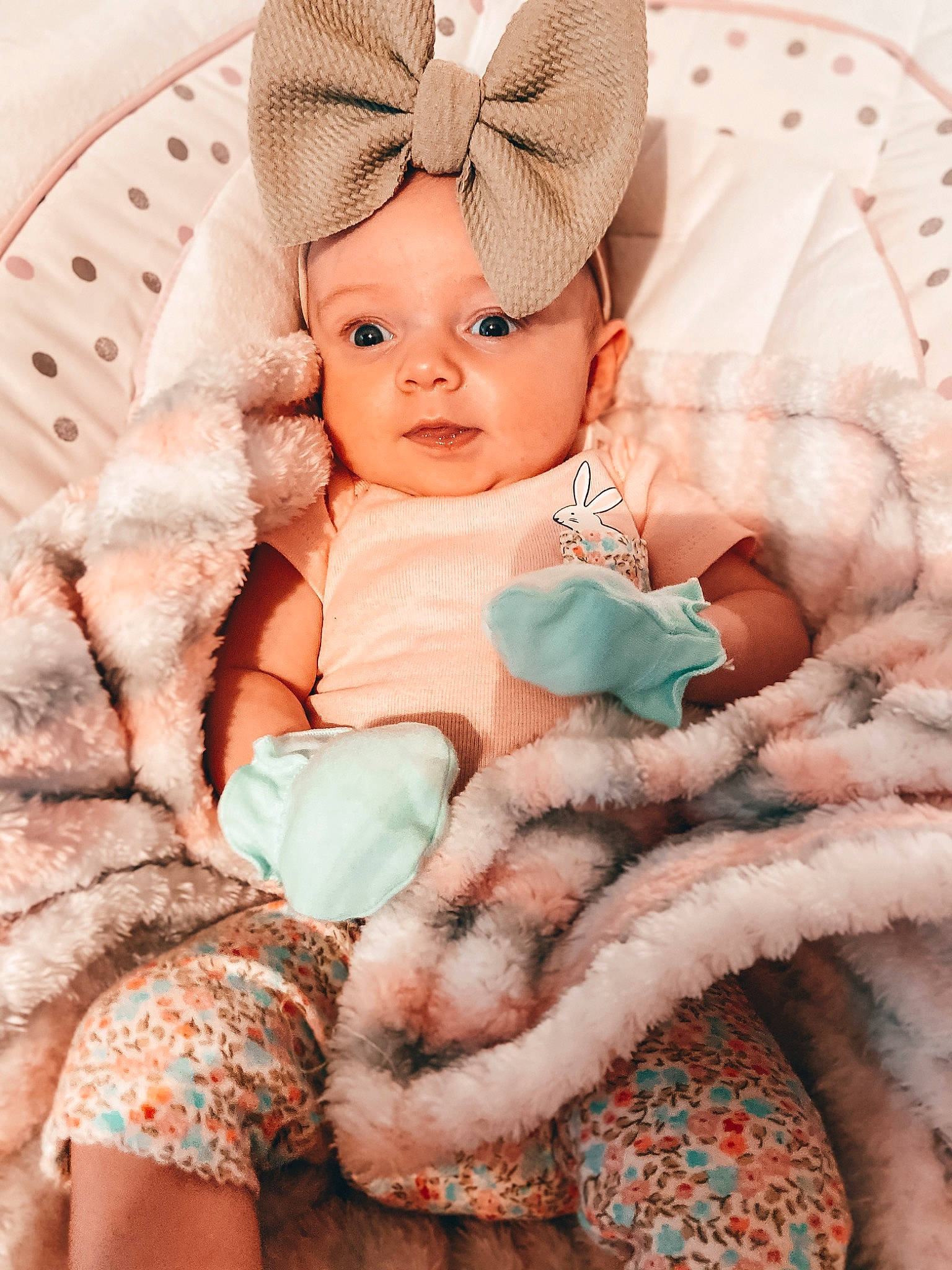 Dorothy is registered to the contest to win money with this photo: baby, baby_products, baby_sleeping, birth, blanket, child, fur, hair_accessory, headgear, linens, pattern, peach, person, photography, pink, product, skin, textile, toddler