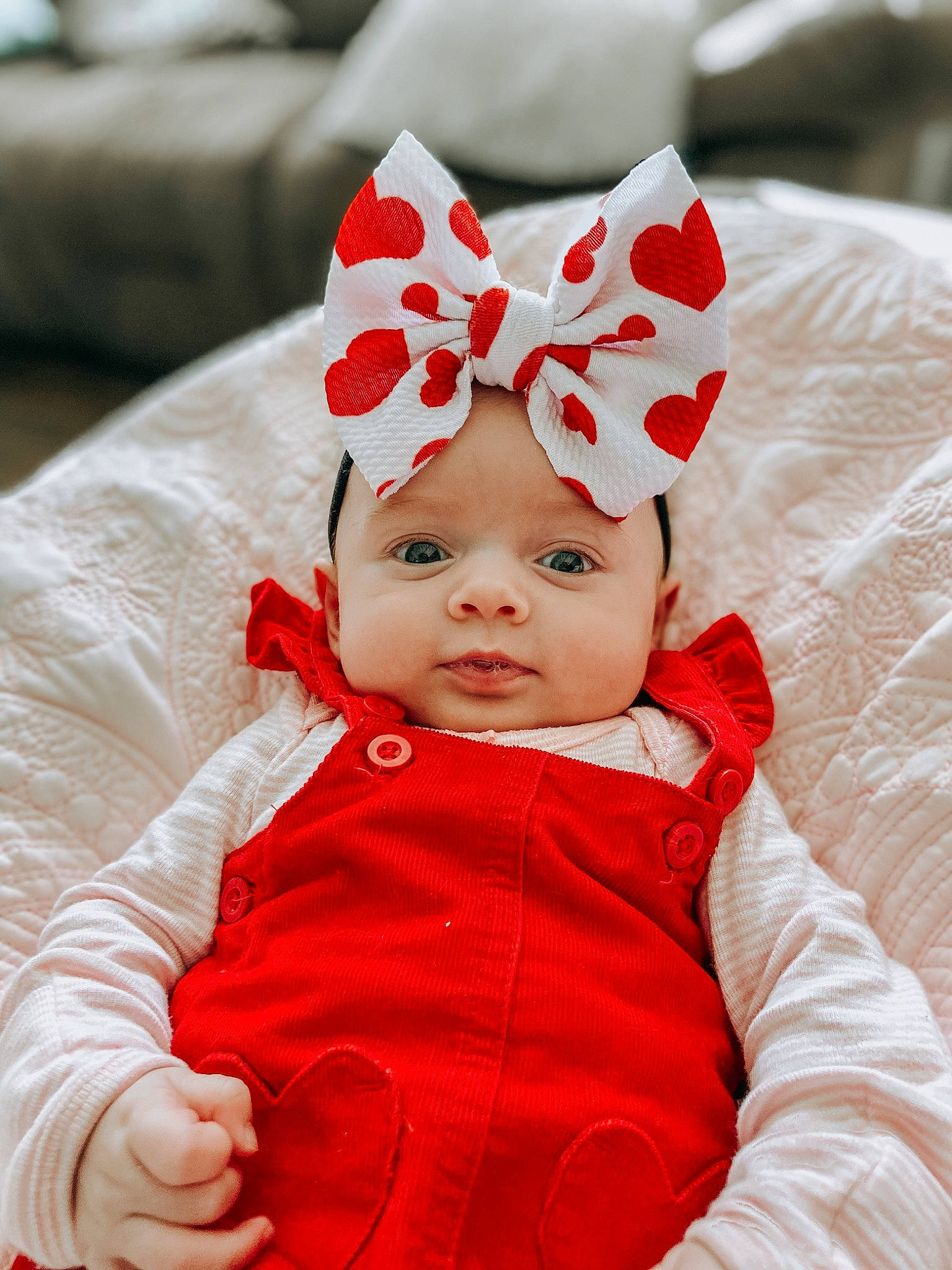 Dorothy is registered to the contest to win money with this photo: baby, child, christmas_eve, costume, costume_accessory, ear, face, fashion_accessory, hair_accessory, head, headgear, headwear, lip, organ, person, red, toddler