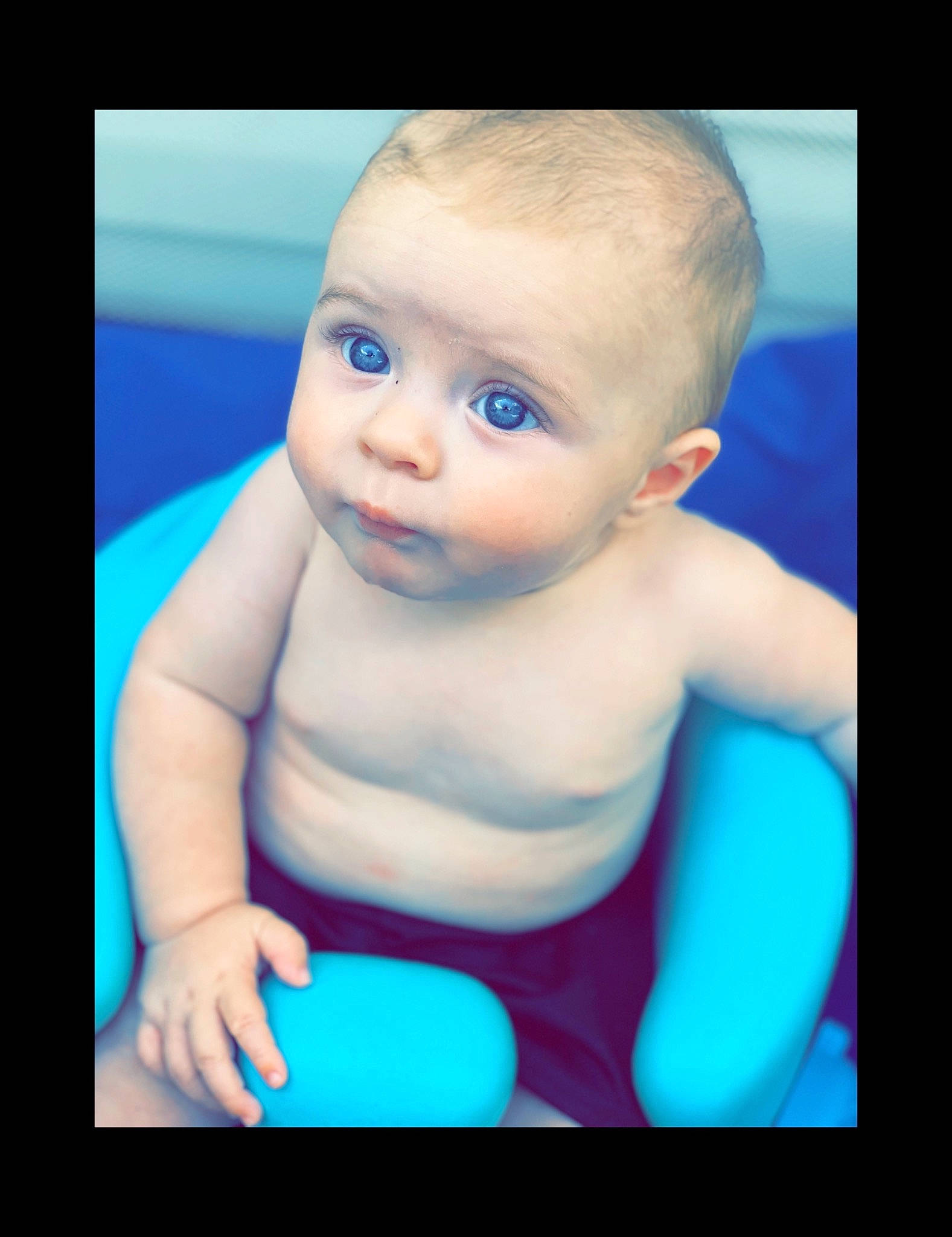 Kaison joined the competition — help win amazing prizes! baby, baby_bathing, baby_making_funny_faces, blue, cheek, child, ear, eye, face, head, iris, lip, person, photography, portrait_photography, recreation, skin, smile, toddler, tummy_time