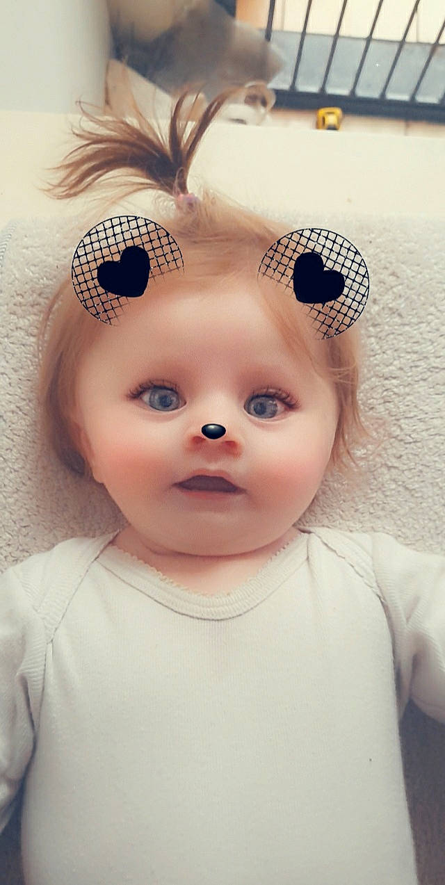 Leana participe au concours pour gagner de l'argent avec cette photo : baby_toddler_clothing, bridal_accessory, cap, cheek, child, chin, ear, eye, eyebrow, eyelash, forehead, happy, headband, headpiece, iris, lip, nose, person, pink, skin