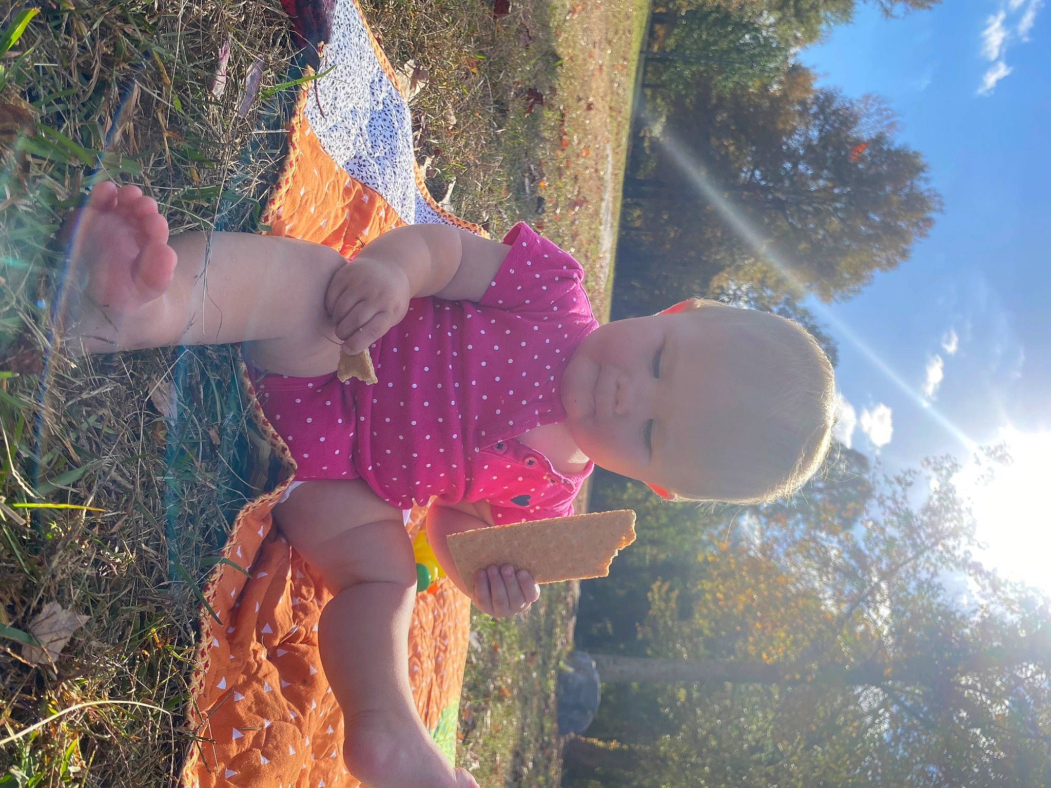 Melody is registered to the contest to win money with this photo: electric_blue, fun, grass, happy, hat, headwear, human_leg, leaf, leisure, lens_flare, light, magenta, people_in_nature, person, pink, plant, sky, sunlight, thigh, tree