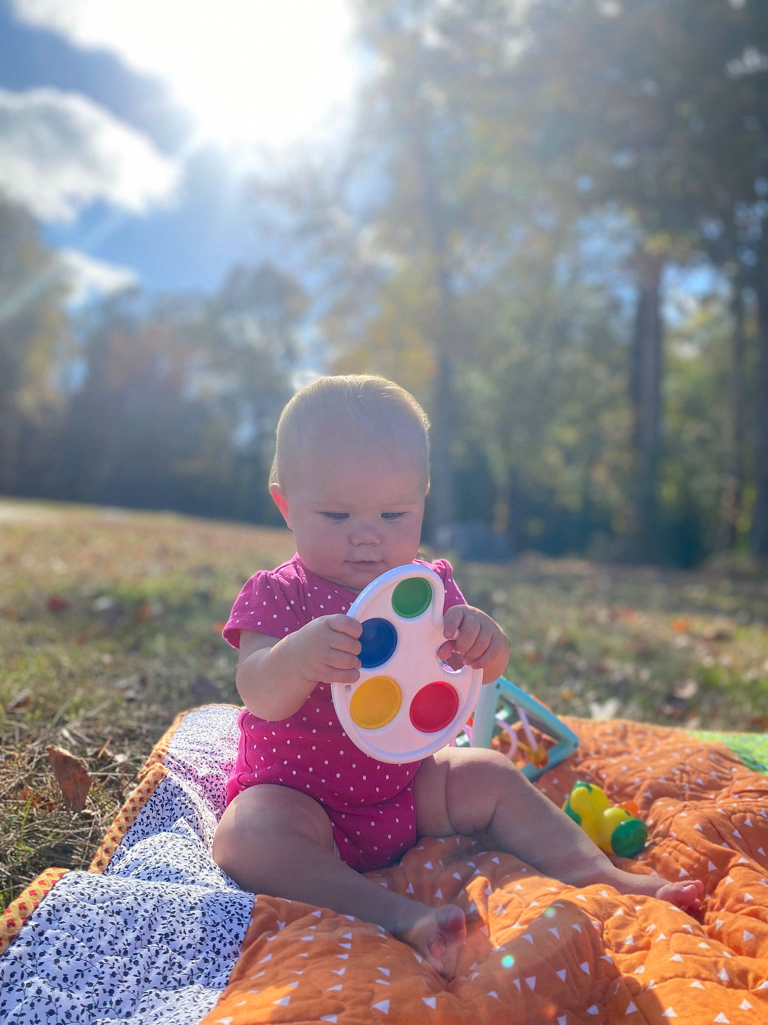 Melody is registered to the contest to win money with this photo: baby, baby_toddler_clothing, beauty, child, cloud, flash_photography, fun, grass, happy, leaf, leisure, people_in_nature, person, plant, recreation, sitting, sky, summer, sunlight, toddler