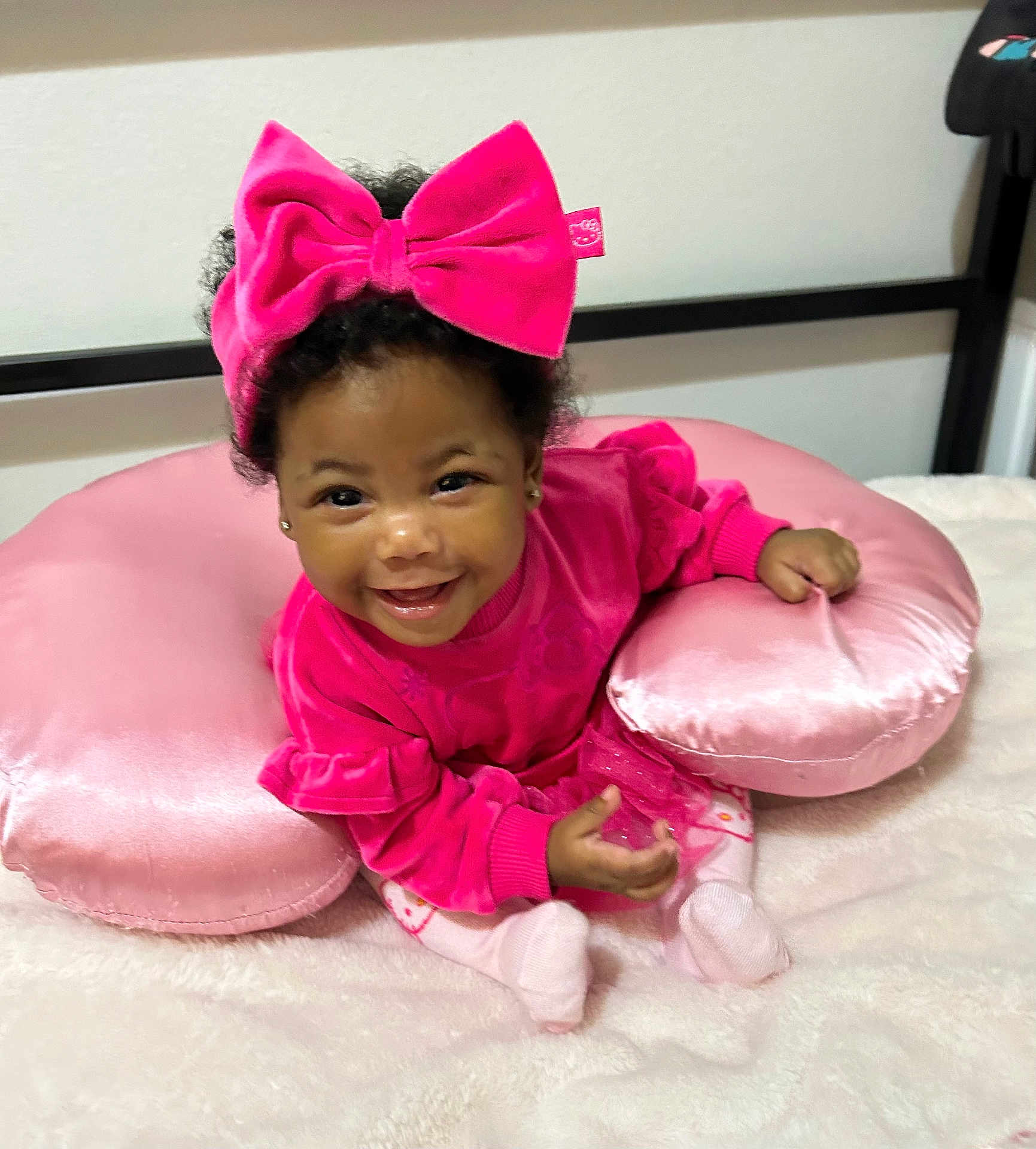 Kaymora is registered to the contest to win money with this photo: accessories, baby, clothing, couch, cream, cushion, dessert, dress, face, furniture, happy, head, homedecor, indoors, person, photography, pillow, portrait, purple, smile