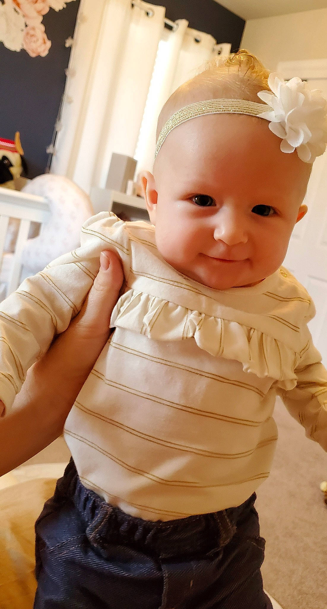 Lilith is registered to the contest to win money with this photo: baby, baby_toddler_clothing, cheek, child, dress, fashion_accessory, hair_accessory, head, headband, headgear, joy, person, skin, sleeve, toddler