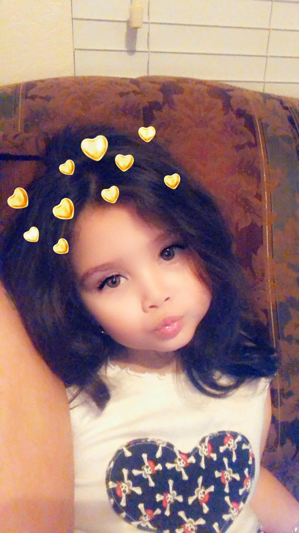 Anabella is registered to the contest to win money with this photo: bangs, black_hair, brown_hair, child, fashion_accessory, hair, hair_accessory, hairstyle, headgear, long_hair, person, toddler