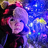 toddler, child, winter, hat, coat, face, outdoor, snow, lights, colorful, holiday, festive, curious, warm_clothing, portrait, cute, night, closeup, winter_wear, glowing